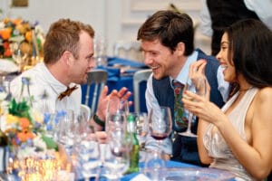 Professional Event Photographer: Candid shot of guests laughing