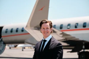 Professional Portraits for VistaJet with logo in background