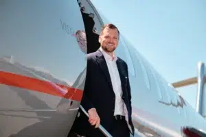 Professional Portraits for VistaJet, at the door of the aeroplane